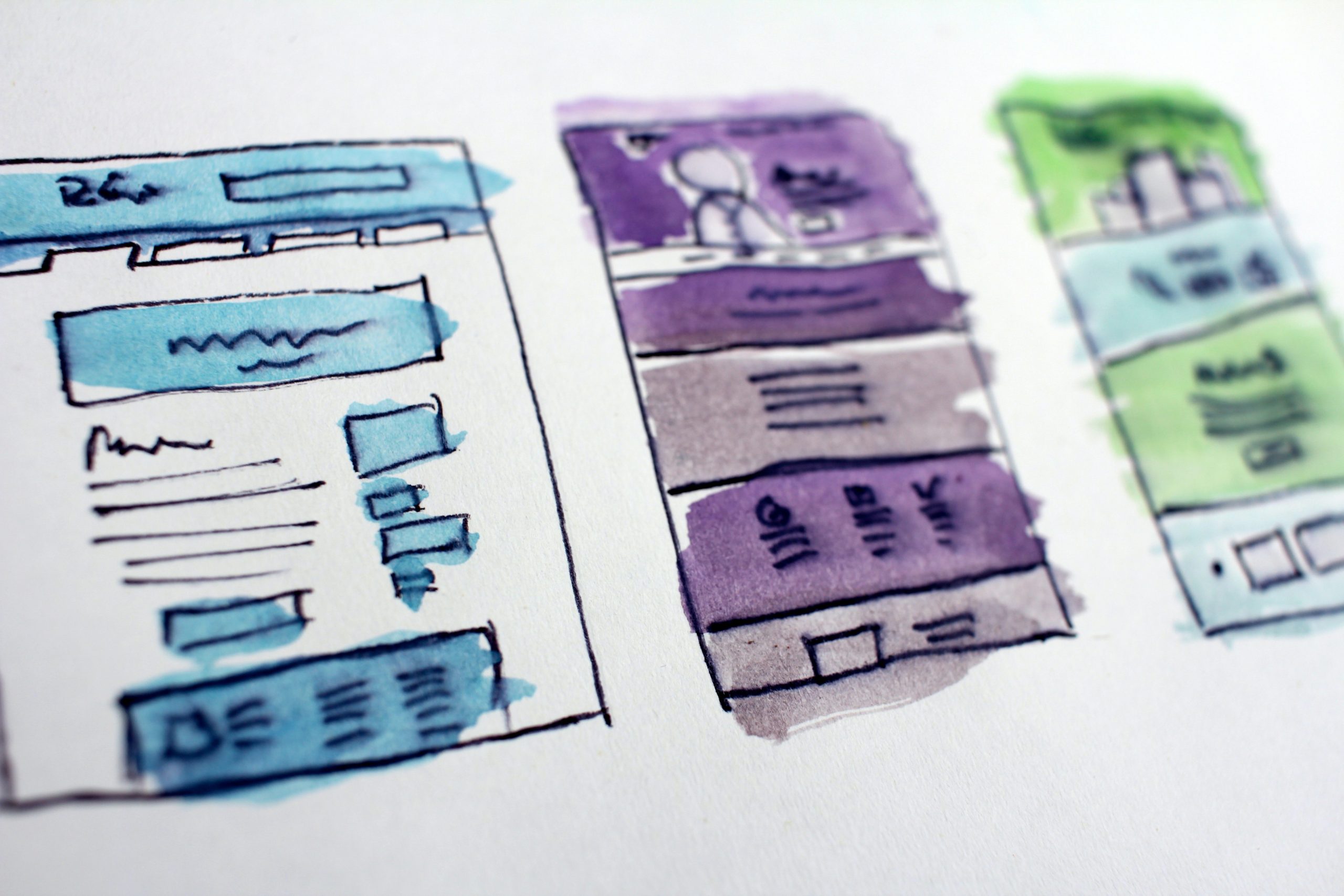 hand drawings of website design in ink and watercolors